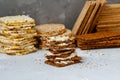 Sandwiches with curd cheese and bread roll for breakfast on a background stacks of various healthy crisp bread