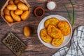 Sandwiches with fried potatoes and green onions