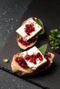 Sandwiches with goat cheese, lingonberry jam
