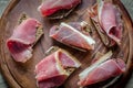 Sandwiches with italian ham on the wooden board Royalty Free Stock Photo