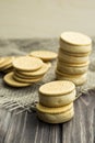 Sandwiches made from cookies and ice cream with condensed milk on a table with burlap Royalty Free Stock Photo