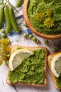 Sandwiches with mashed green peas vertical top view close up Royalty Free Stock Photo