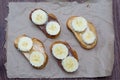 Sandwiches with peanut butter and chocolate paste with banana slices on a dark background. Home Fast Food Concept Royalty Free Stock Photo