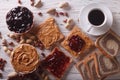 Sandwiches with peanut butter and coffee top view horizontal Royalty Free Stock Photo