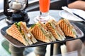 Sandwiches on plate, Grilled bread with lettuce, shrimp and egg.