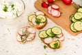 Sandwiches with radish and sour cream sauce