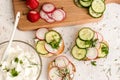 Sandwiches with radish and sour cream sauce