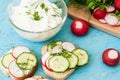 Sandwiches with radish and sour cream sauce