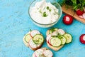 Sandwiches with radish and sour cream sauce