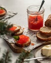 Sandwiches with red caviar on light textured background Royalty Free Stock Photo