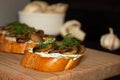 Sandwiches with soft cheese, mushrooms and dill. Side view close. Healthy delicious Breakfast, Italian cuisine. Champignons in the