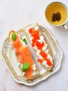 Sandwiches with soft cheese and smoked salmon caviar Royalty Free Stock Photo