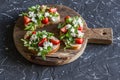 Sandwiches with strawberries, arugula and blue cheese. Delicious snack, breakfast or a snack with wine. Royalty Free Stock Photo