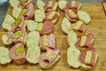 Sandwiches stuffed with Italian cold cuts and cheeses ready for a bar window