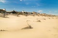 Sandy Atlantic ocean beach. Beach houses. Royalty Free Stock Photo