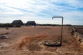 Old rusty shower on a sandy beach on the coast of Sardinia in Italy Royalty Free Stock Photo