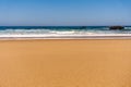 Sandy beach of Atlantic ocean coastline in Portugal Royalty Free Stock Photo