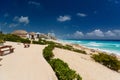 Sandy beach with azure water on a sunny day near Cancun, Mexico Royalty Free Stock Photo