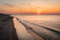 The sandy beach of Baltic sea at sunset. Nida, Lithuania