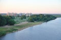 Sandy beach on the banks of the Volga against the background of a construction site, Moscow region, July 2021 Royalty Free Stock Photo