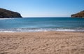 Sandy beach, blue clear sky, calm sea water background, Greece. Kea island Royalty Free Stock Photo