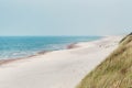 Sandy beach and a blue sea. Baltic sea, Nida, Lithuania.
