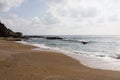 Sandy beach with blue sea Royalty Free Stock Photo