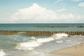 Sandy beach with breakwaters on the background of the sea5 Royalty Free Stock Photo
