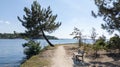 Sandy beach and calm lacanau gironde lake water with the other shore in horizon Royalty Free Stock Photo