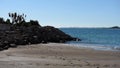 Sandy beach and calm Mediterranean Sea during sunny day. Spain