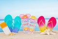 Sandy beach with different beach accessories. Summer vacation