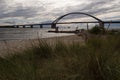 Sandy beach with Fehmarn Sund bridge in the background