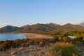 Sandy beach of Galeria with Fango delta in the midst of rocky coastline between Galeria and Calvi. Corsica, France. Royalty Free Stock Photo