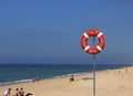 Sandy Beach With Life Guard Ring At Faro In the Algarve Region of Portugal Royalty Free Stock Photo