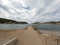 Sandy beach landscape of Meditteranean sea coast and mountain background in Port de Soller, Palma de Mallorca, Spain, Europe Royalty Free Stock Photo