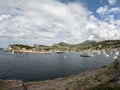 Sandy beach landscape of Meditteranean sea coast and mountain background in Port de Soller, Palma de Mallorca, Spain, Europe Royalty Free Stock Photo