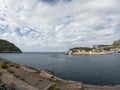 Sandy beach landscape of Meditteranean sea coast and mountain background in Port de Soller, Palma de Mallorca, Spain, Europe Royalty Free Stock Photo