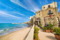 Sandy beach near clear blue sea in Cefalu, Sicily, Italy Royalty Free Stock Photo