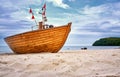 Sandy beach with old wooden fishing boat on the Baltic Sea in Binz. Island Ruegen, Germany Royalty Free Stock Photo