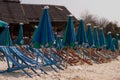 Sun loungers and parasols on the sandy beach Royalty Free Stock Photo