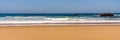 Sandy beach with Rock formation, Atlantic ocean coastline of Portugal. Royalty Free Stock Photo