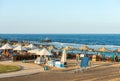 Sandy Beach and Seascape of Red Sea with Many Tourists - Egypt Africa