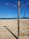 Sandy beach shower with blue sky in the background, closeup of photo Royalty Free Stock Photo