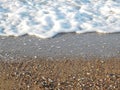 Sandy beach with small pebbles Royalty Free Stock Photo