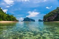 Sandy beach spit and tourist wooden Thai boats