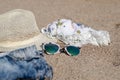 Sandy beach with summer accessories Royalty Free Stock Photo