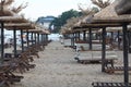 Sandy beach sunbeds umbrellas