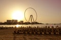 Sandy beach during sunset in the area of Dubai Marina. Royalty Free Stock Photo