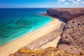 Sandy beach surrounded by cliff near Morro Jable, Jandia, Fuerteventura, Canary Islands, Spain. Royalty Free Stock Photo