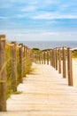 Sandy boardwalk path to the beach